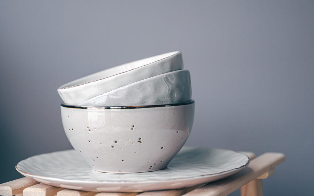 a set of beautiful plates in pastel colors on a gray background.